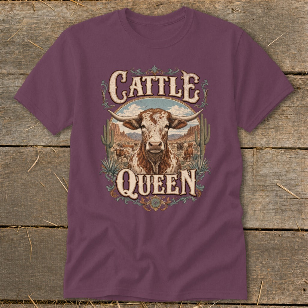 Burgundy t-shirt with "Cattle Queen" text and a longhorn steer in a desert landscape.