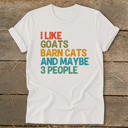 White t-shirt with retro text: "I like goats barn cats and maybe 3 people."