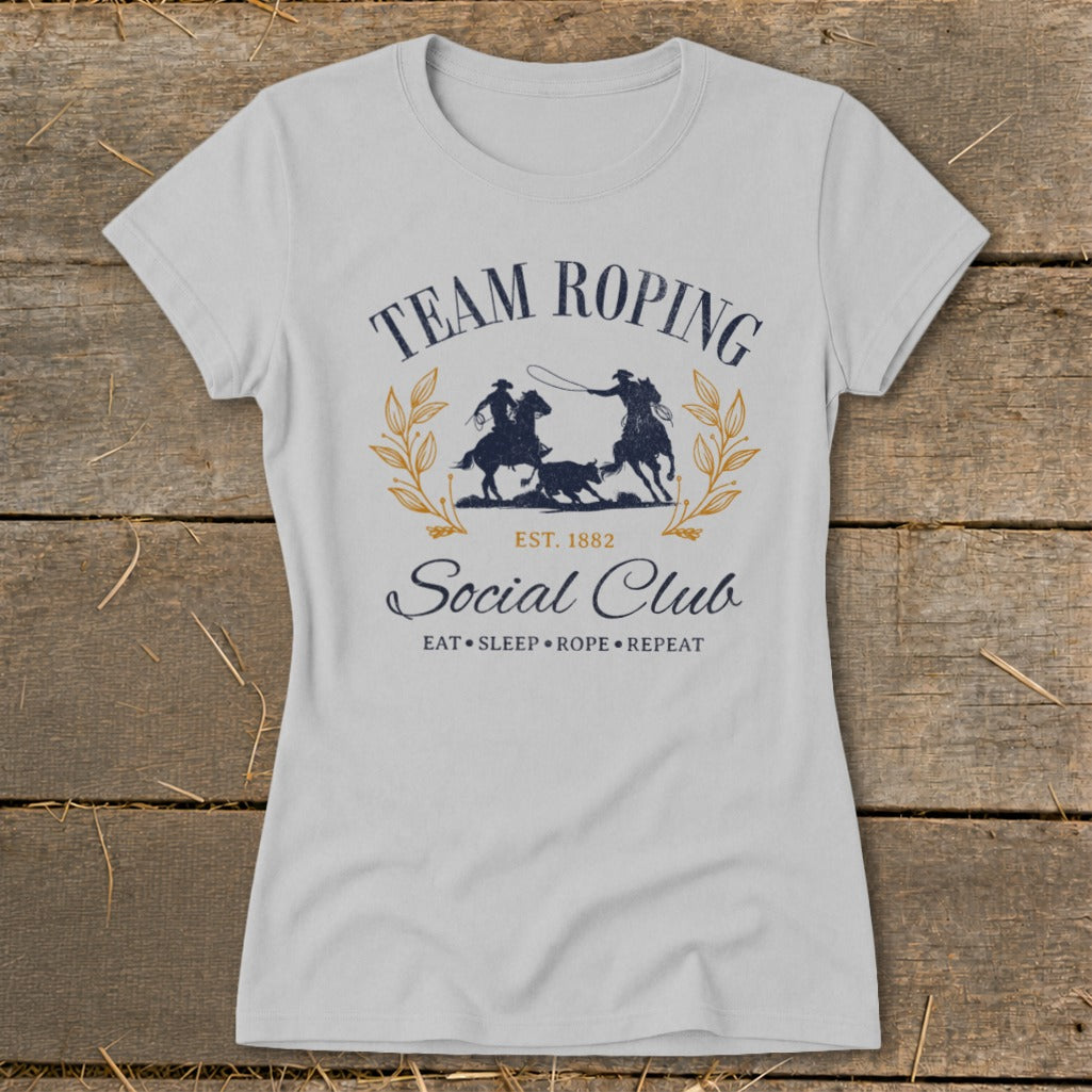 Light gray t-shirt with "Team Roping Social Club Est. 1882" and rodeo graphic.