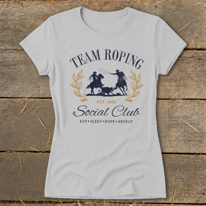 Light gray t-shirt with "Team Roping Social Club Est. 1882" and rodeo graphic.