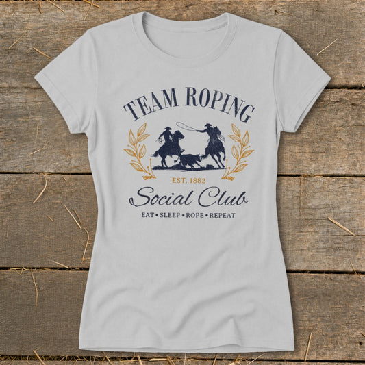 Light gray t-shirt with "Team Roping Social Club Est. 1882" and rodeo graphic.