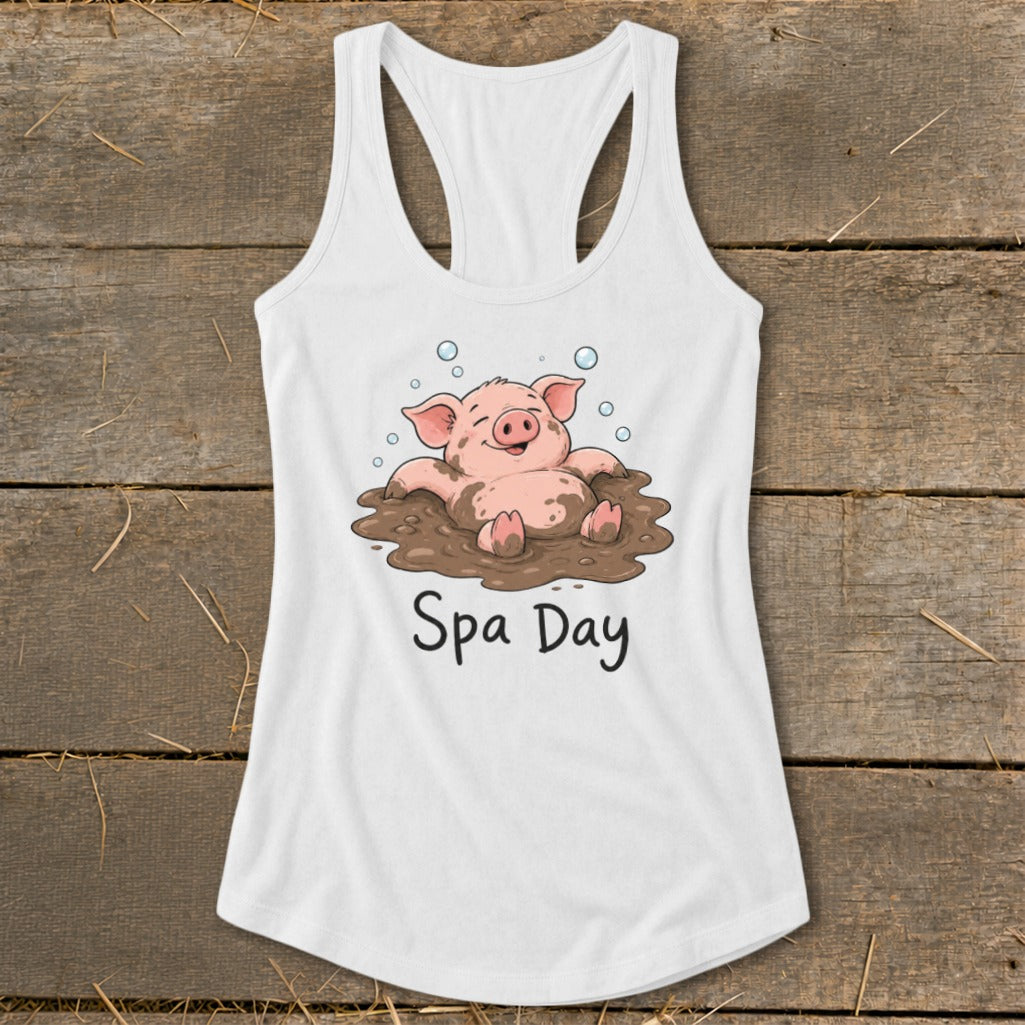 White tank top with cartoon pig in mud, reading "Spa Day".