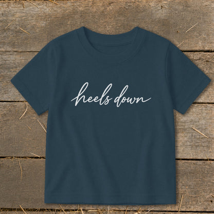 Navy t-shirt with white cursive text reading "heels down".