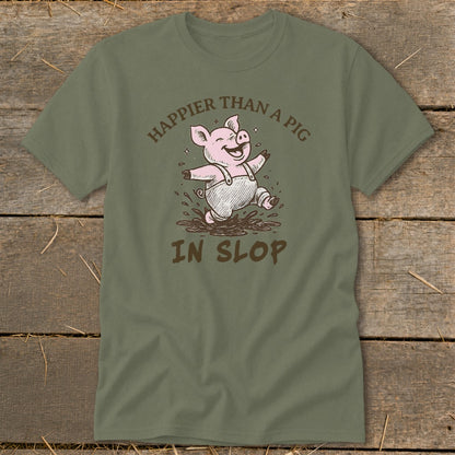 Green t-shirt with a cartoon pig jumping in slop, text reads "Happier than a pig in slop".