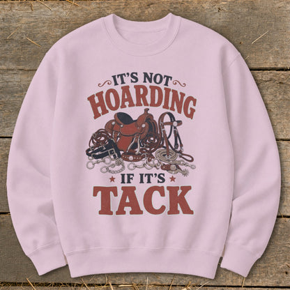Pink sweatshirt with vintage horse tack graphic and text.