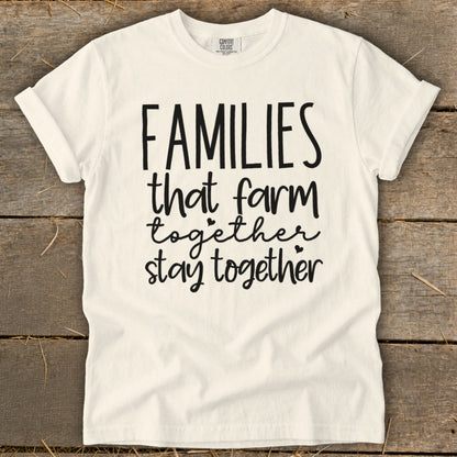 Cream t-shirt with "FAMILIES that farm together stay together" text in black.