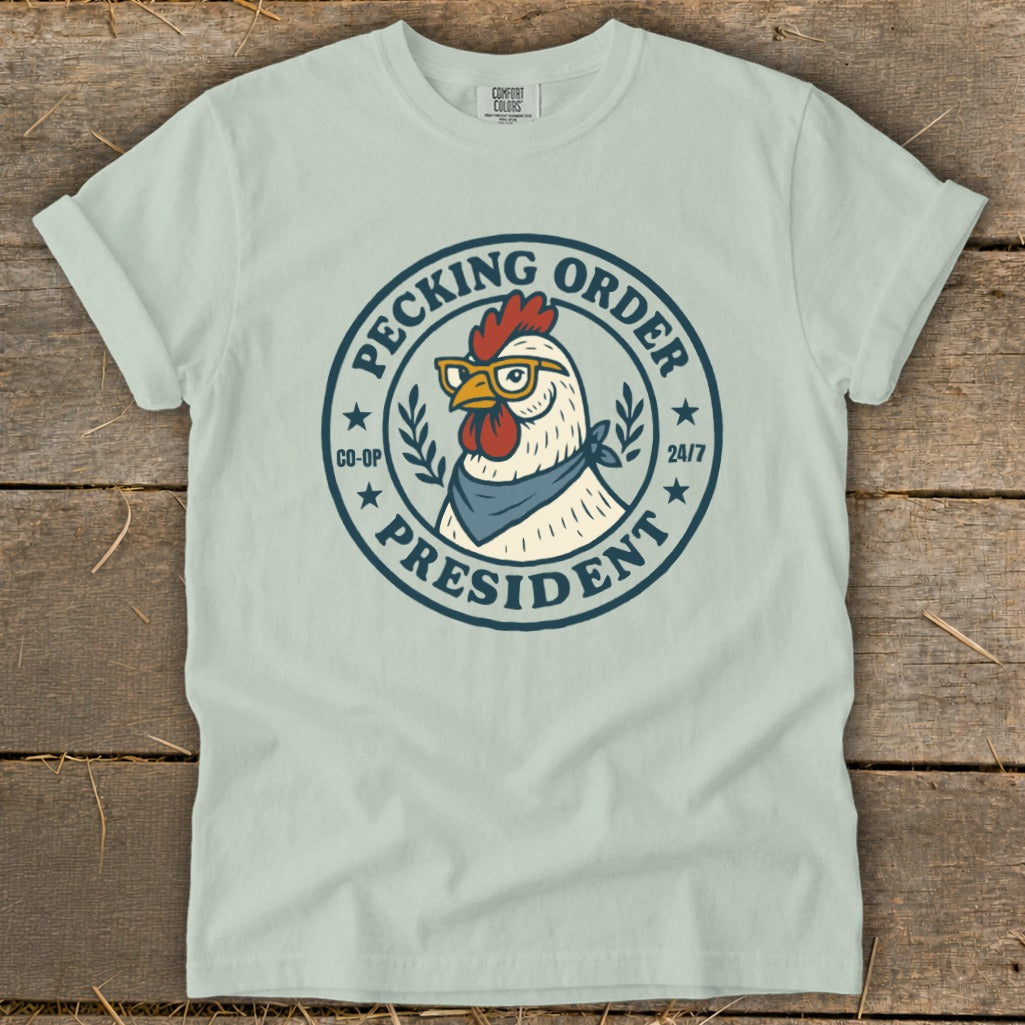 Chicken wearing glasses and bandana graphic with text "Pecking Order President".