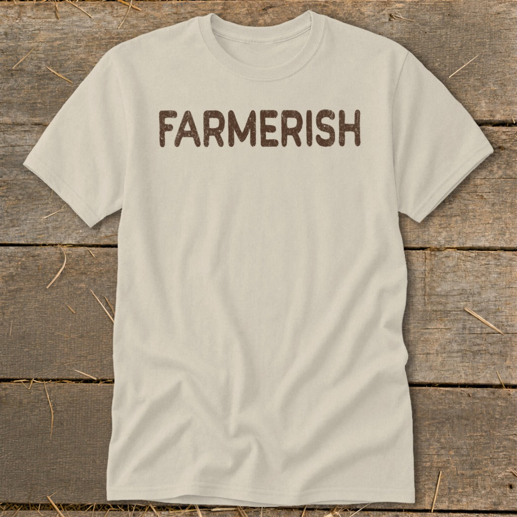 Light beige t-shirt with brown distressed "FARMsHERISH" text across the chest.