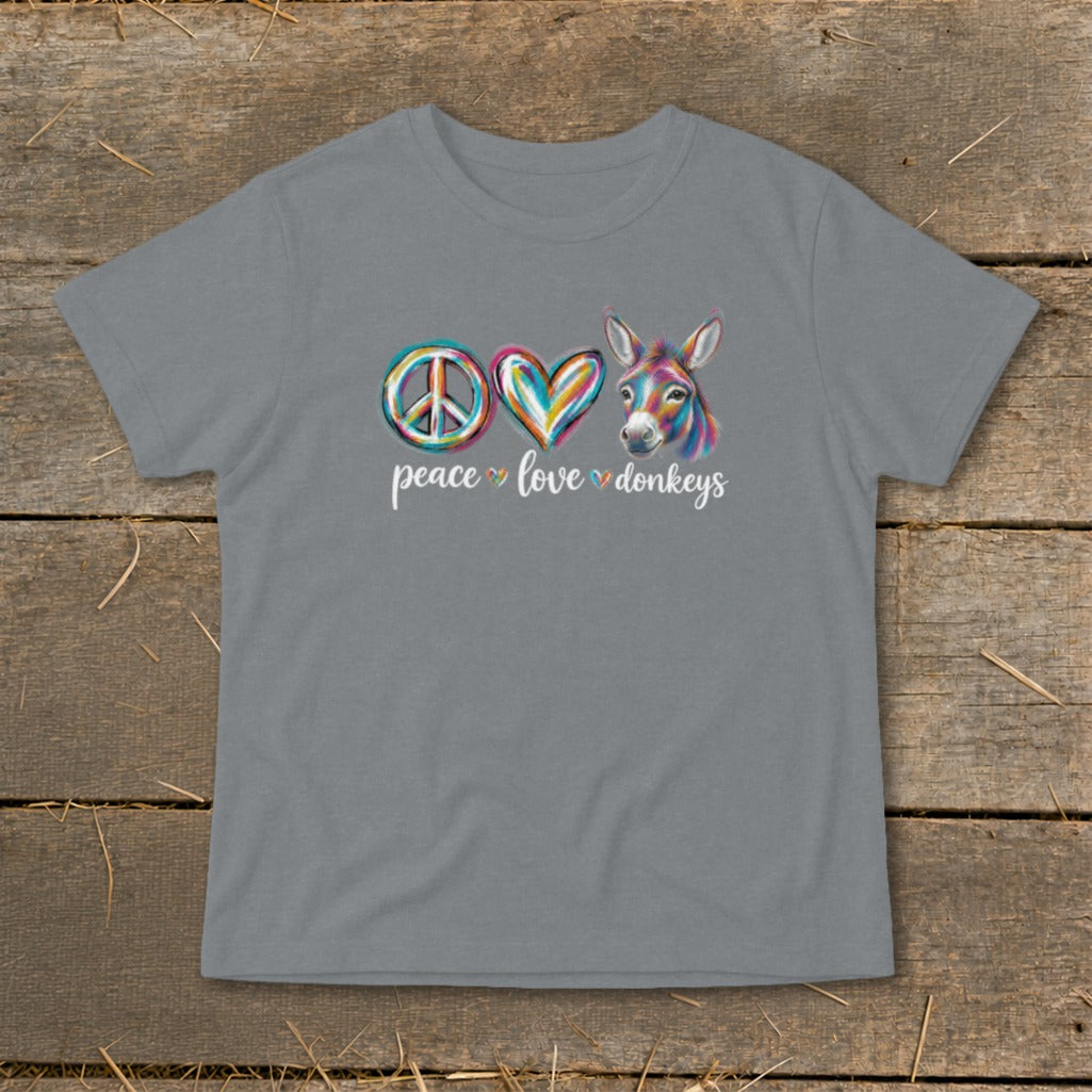 Gray t-shirt with a graphic of a peace sign, heart, and colorful donkey with text.
