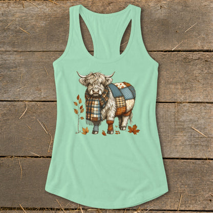 Highland cow with patchwork body and plaid scarf on mint green tank top.