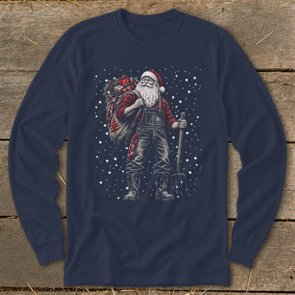Santa Claus in overalls and plaid shirt carries gifts and a pitchfork.