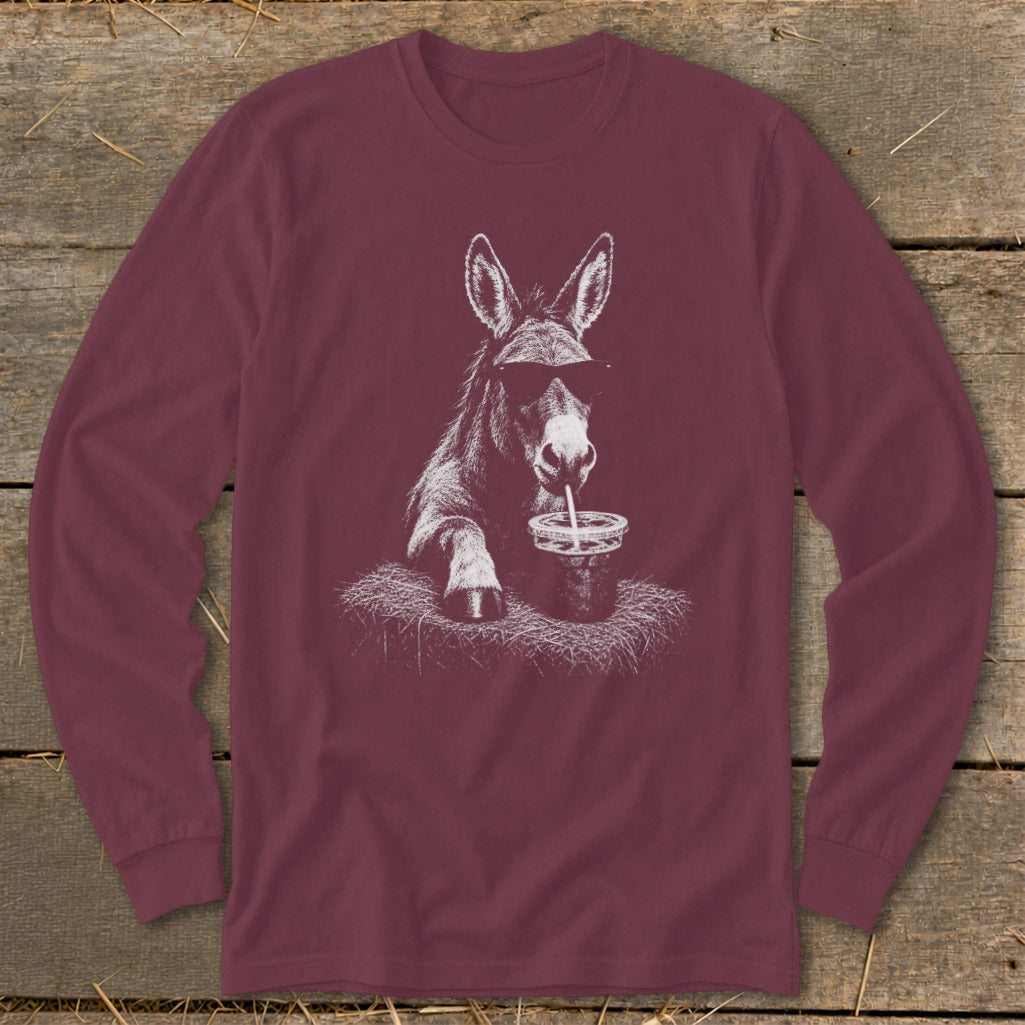 Maroon long sleeve shirt with a white graphic of a donkey wearing sunglasses drinking from a cup.