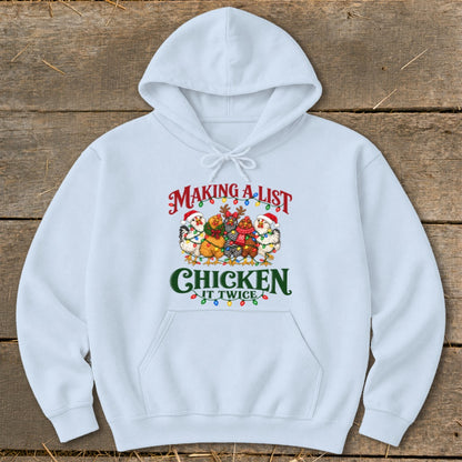 Light blue hoodie with Christmas chickens and text "MAKING A LIST CHICKEN IT TWICE".