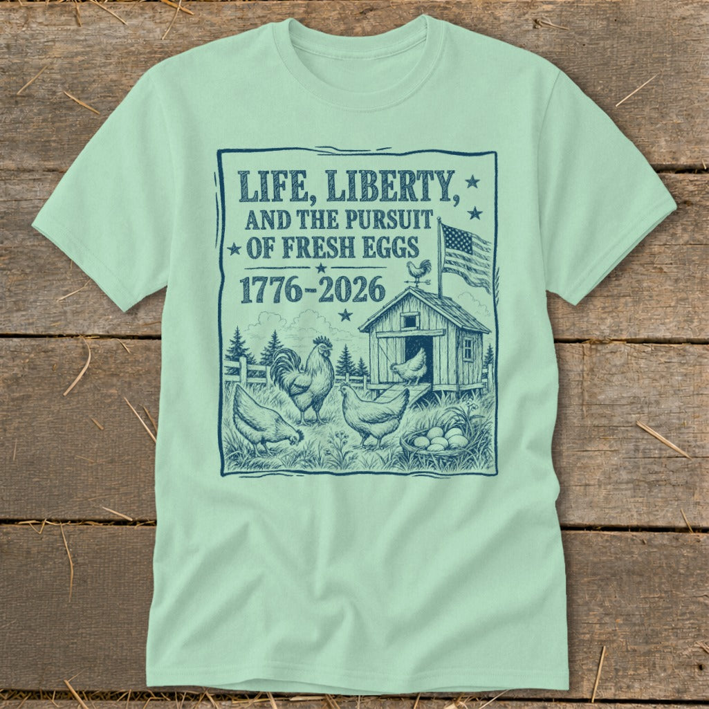 T-shirt with "Life, Liberty, and the Pursuit of Fresh Eggs" graphic and chickens.
