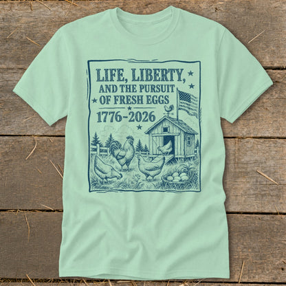 T-shirt with "Life, Liberty, and the Pursuit of Fresh Eggs" graphic and chickens.