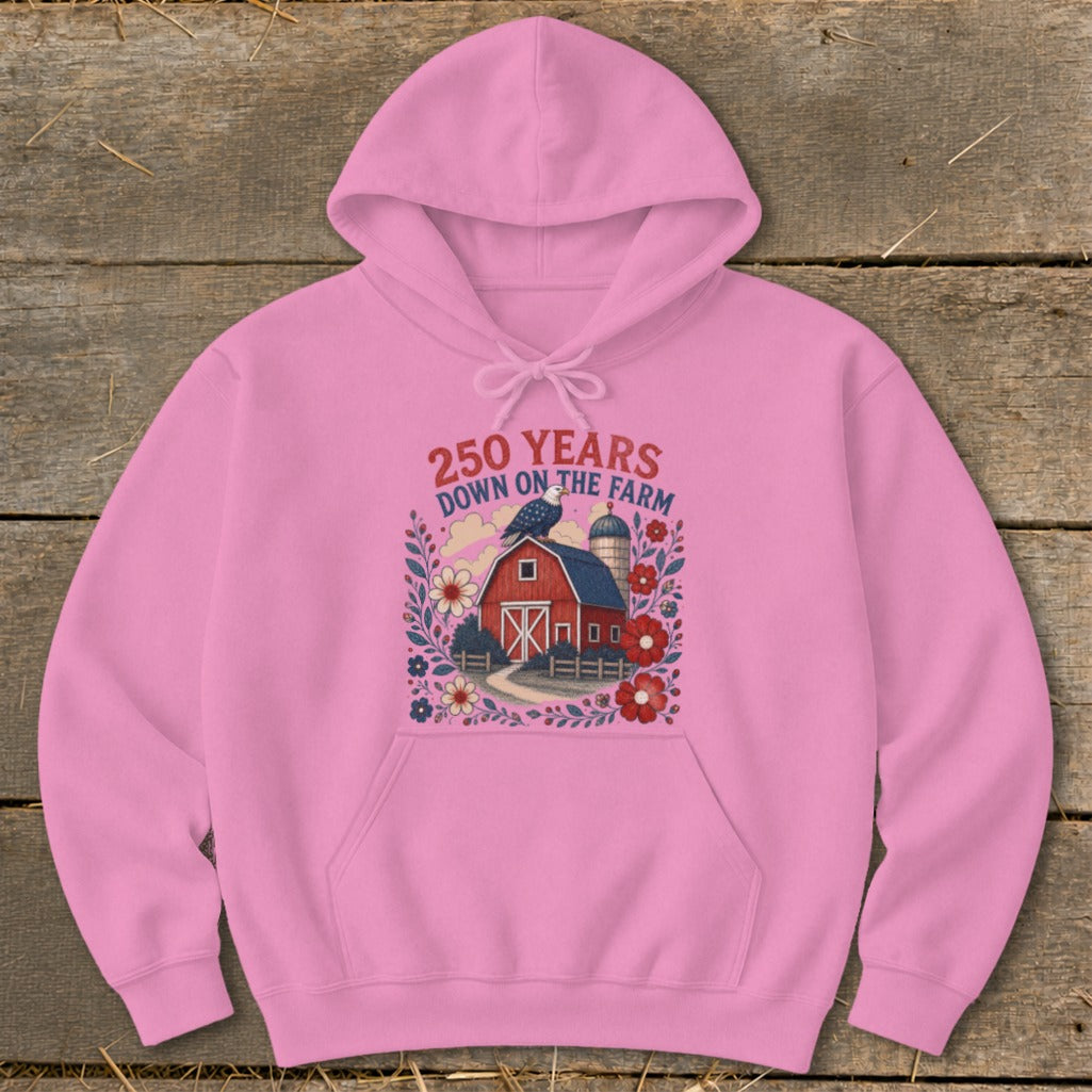 Pink hoodie with graphic of red barn, silo, and flowers, reads "250 YEARS DOWN ON THE FARM."