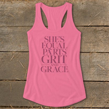 Pink tank top with text "She's equal parts grit and grace".