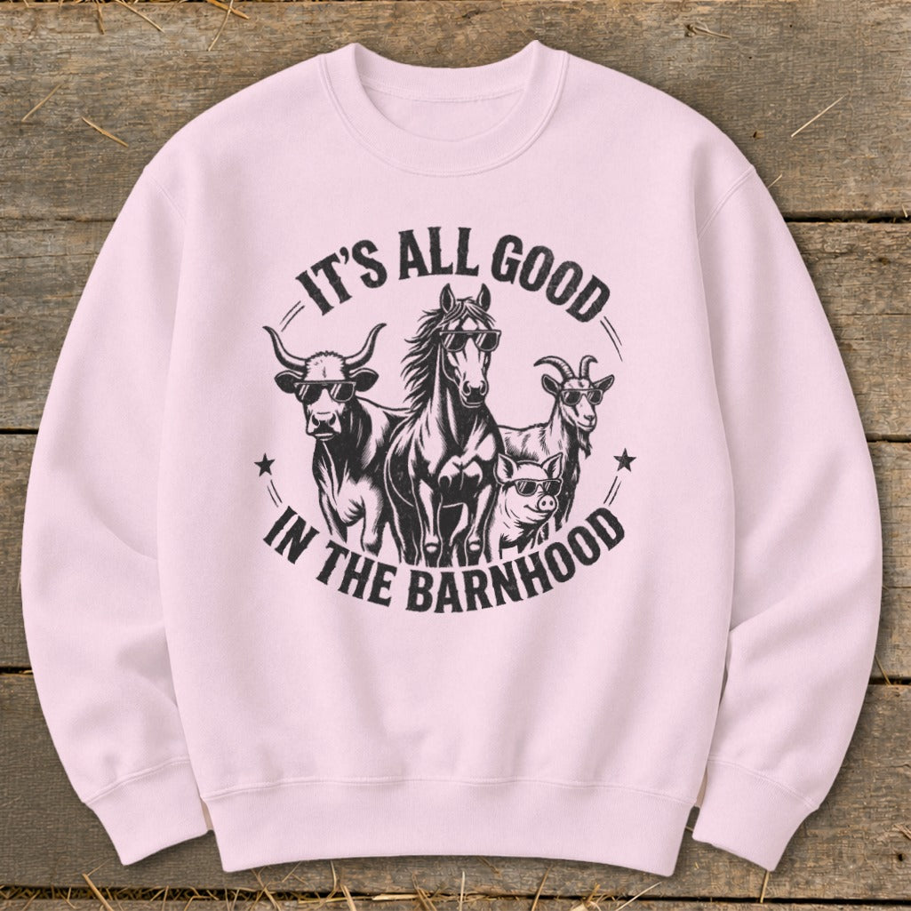Pink sweatshirt with a black graphic of farm animals wearing sunglasses and text.