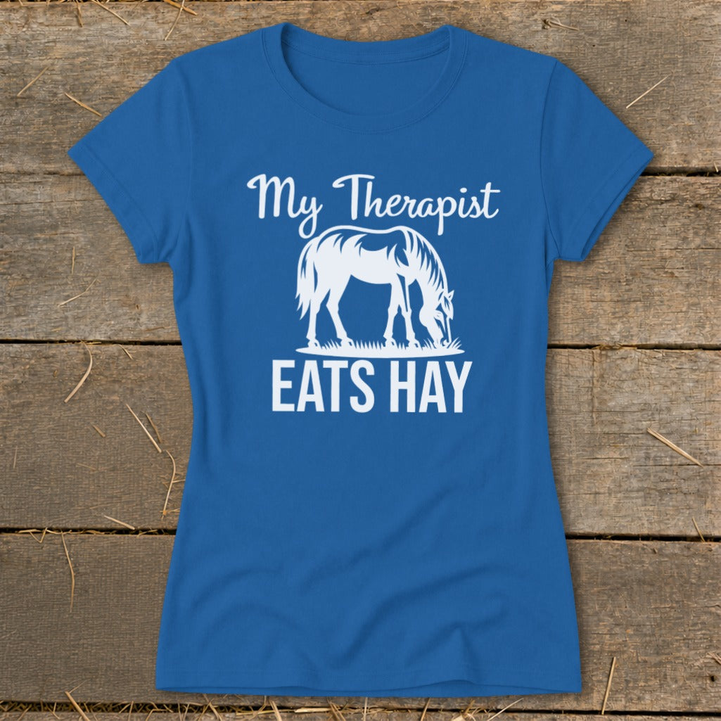 Blue t-shirt with white text and horse graphic: "My Therapist EATS HAY"
