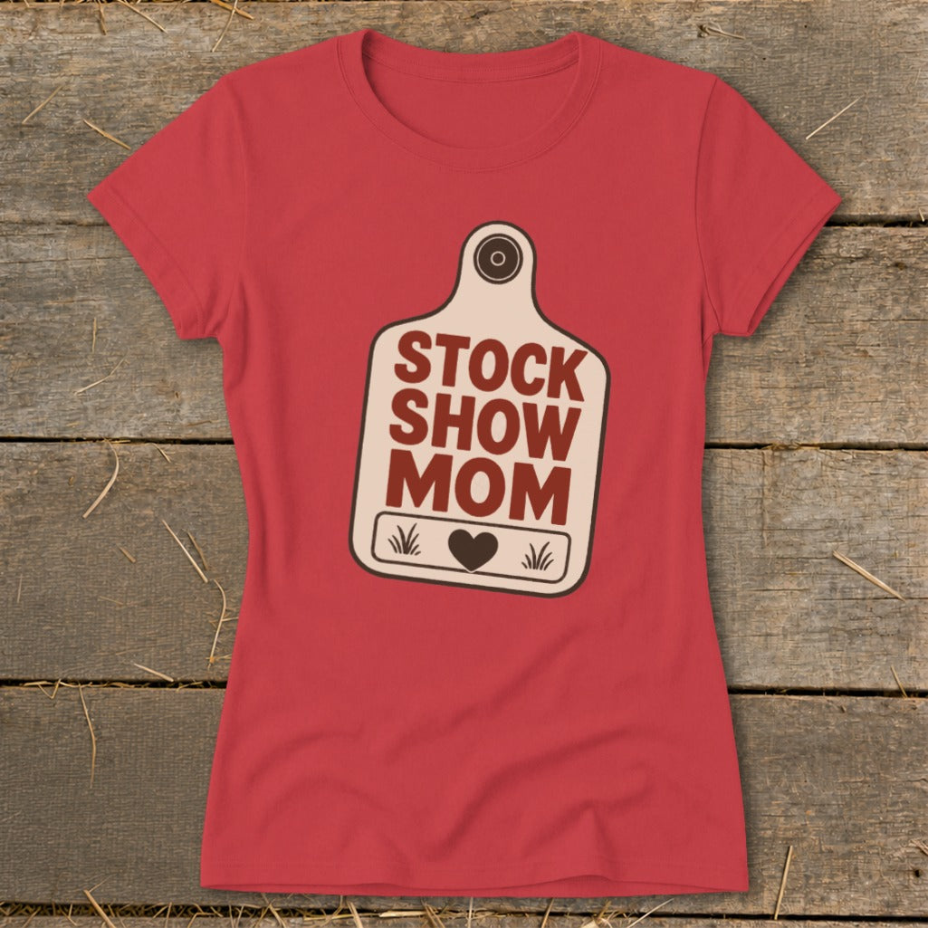 Red t-shirt with "STOCK SHOW MOM" text on a tag graphic.