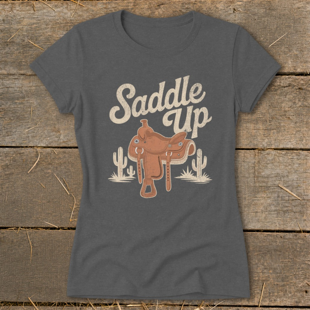 Grey t-shirt with "Saddle Up" text and a Western saddle illustration.