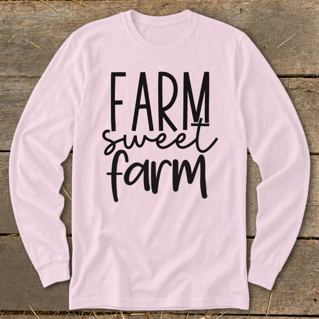 Pink long sleeve shirt with "FARM sweet farm" text in black.