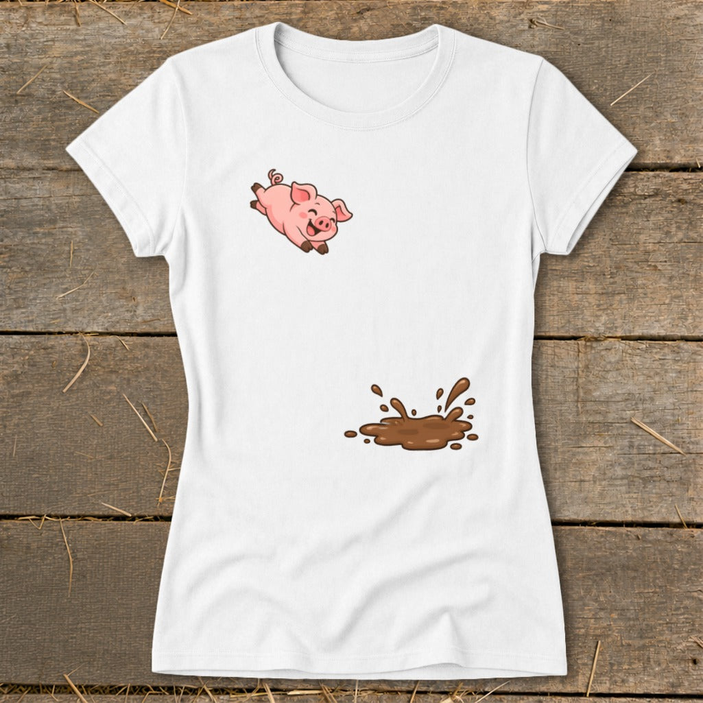 White t-shirt with a cartoon pig jumping into a mud puddle graphic.