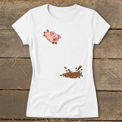 White t-shirt with a cartoon pig jumping into a mud puddle graphic.