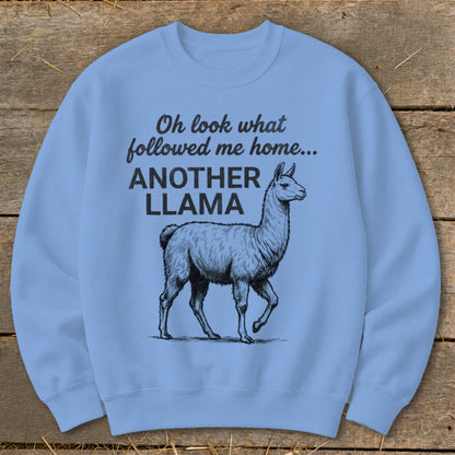 Light blue crewneck sweatshirt with a black graphic of a llama and text.