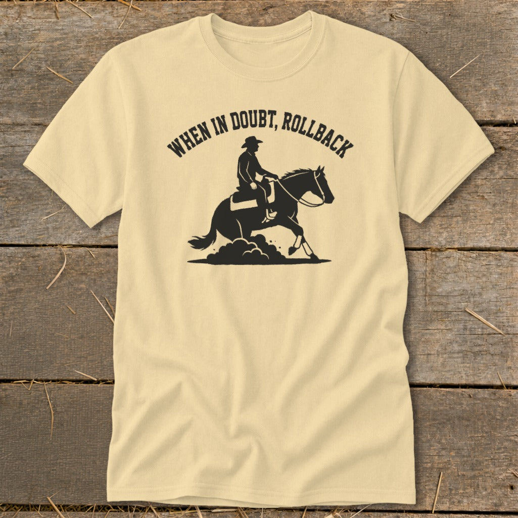 Light yellow t-shirt with black graphic of a rider and horse, saying "When in doubt, rollback".