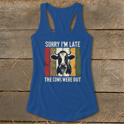 Blue tank top with "Sorry I'm Late The Cows Were Out" and a cow graphic.