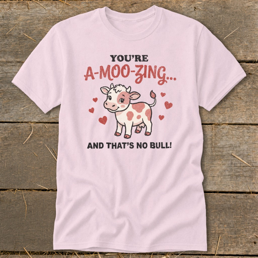 Pink t-shirt with "You're A-Moo-Zing... And That's No Bull!" text and cartoon cow.