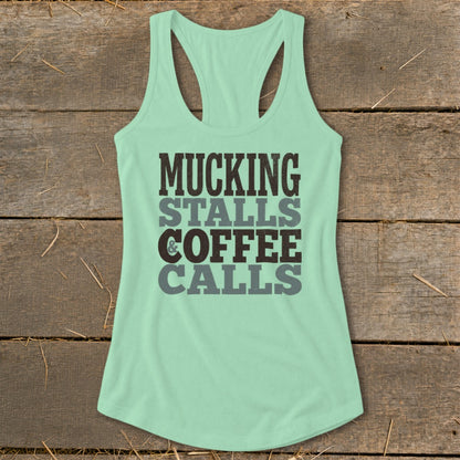 Mint green tank top with "Mucking Stalls & Coffee Calls" graphic.