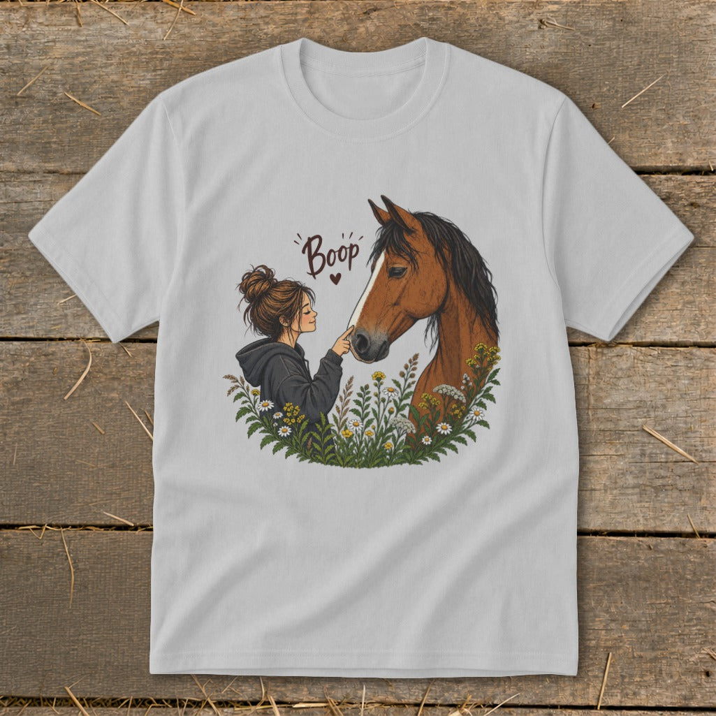 Girl gently booping horse nose surrounded by flowers, with "Boop" text.