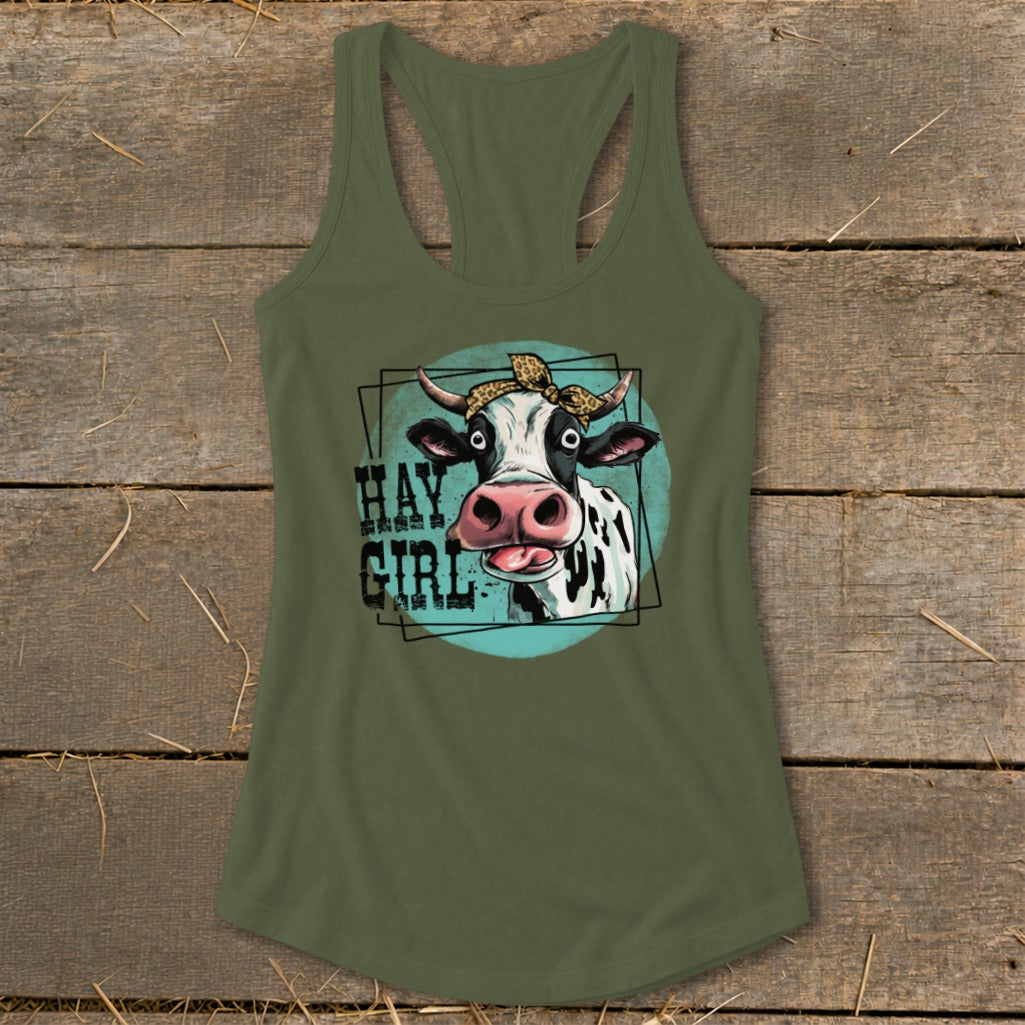 Tank top with a cartoon cow wearing a bandana and the text "HAY GIRL".