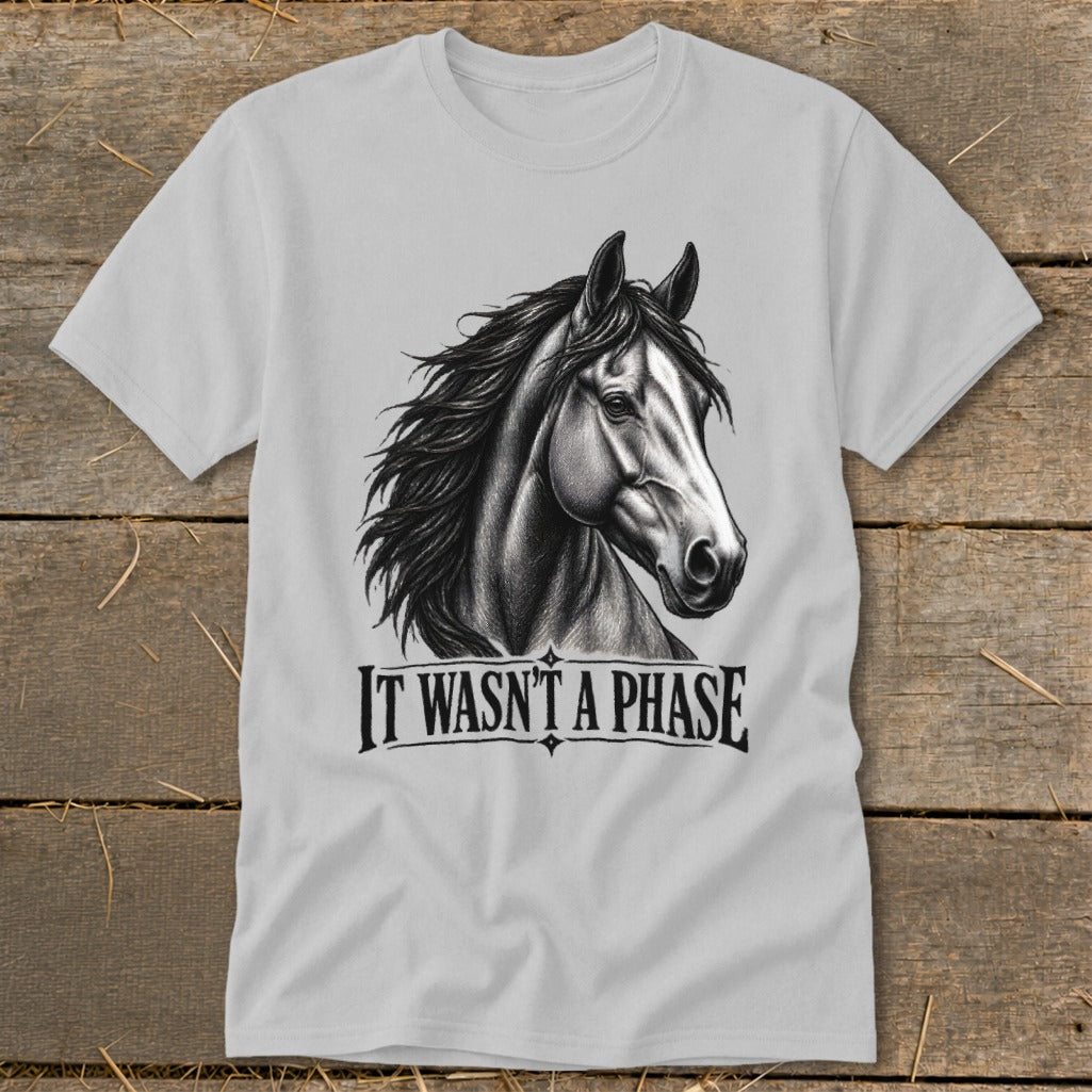Gray t-shirt with a black and white sketch of a horse's head and the text "IT WASN'T A PHASE".