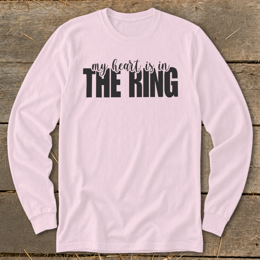 Pink long sleeve shirt with "my heart is in THE RING" text in black.