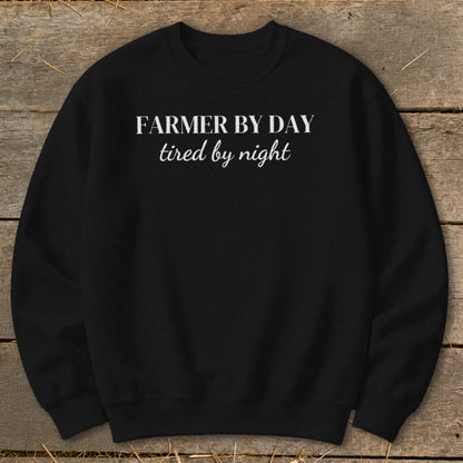 Black sweatshirt with "FARMER BY DAY tired by night" white text.