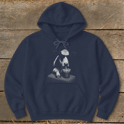 Navy hoodie with black and white cow wearing sunglasses drinking from cup.