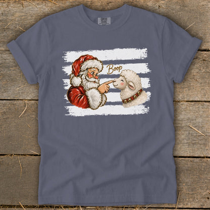 Santa booping a sheep with "Boop" text on a distressed striped background.