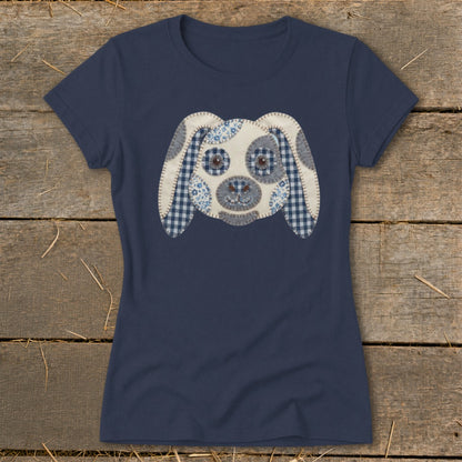 Navy t-shirt with a stitched blue and white patchwork dog face applique.