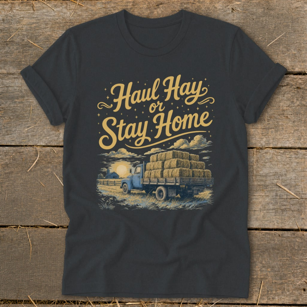 Dark t-shirt with "Haul Hay or Stay Home" text and illustration of a truck hauling hay.