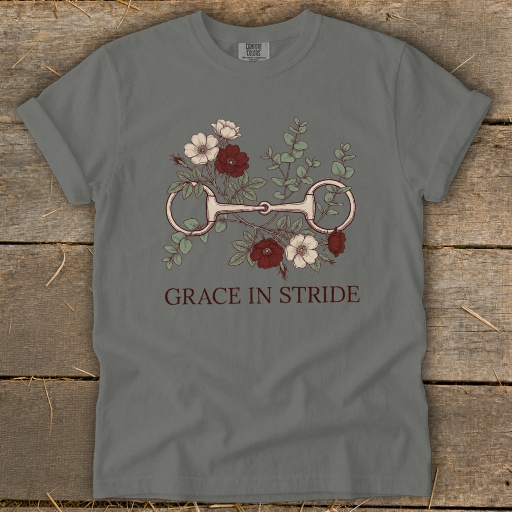 Gray t-shirt with horse bit and flowers design, reads "GRACE IN STRIDE."