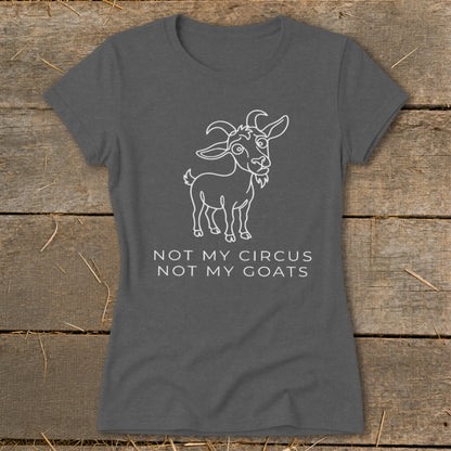 Dark gray t-shirt with a white line drawing of a goat and text "NOT MY CIRCUS NOT MY GOATS".