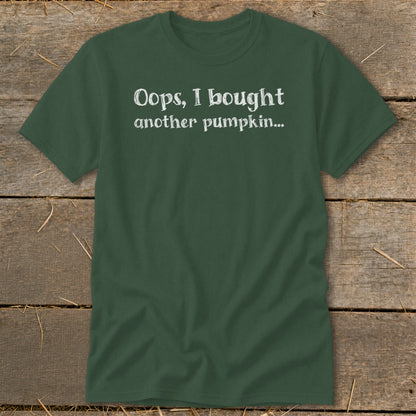 Dark green t-shirt with white text "Oops, I bought another pumpkin..."