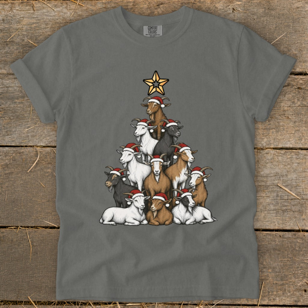 Goats stacked in a Christmas tree shape wearing Santa hats, topped with a star.