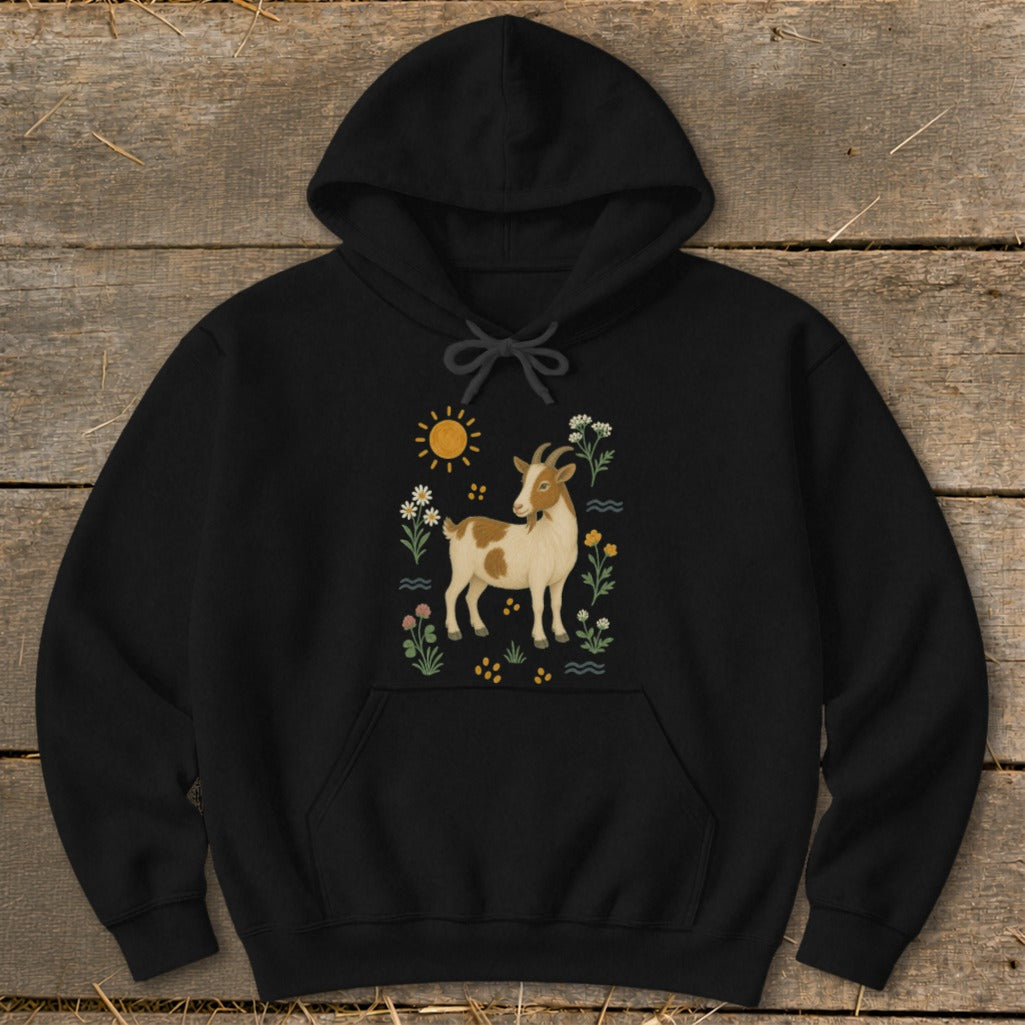 Black hoodie with a brown and white goat surrounded by flowers and a sun.