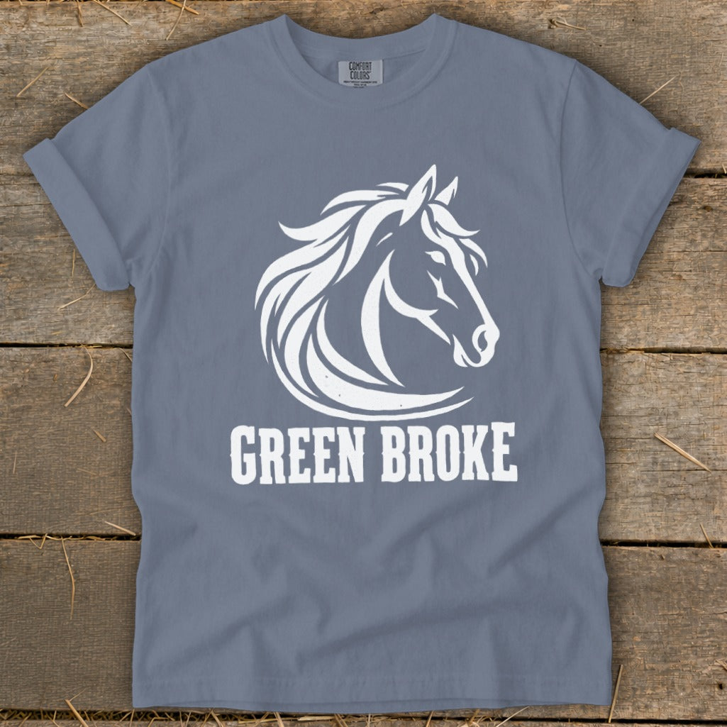 Blue short-sleeved t-shirt with a white graphic of a horse head and the text GREEN BROKE.