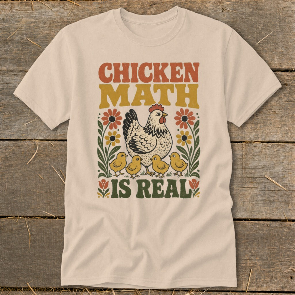 Light cream t-shirt with "CHICKEN MATH IS REAL" text and chicken illustration.