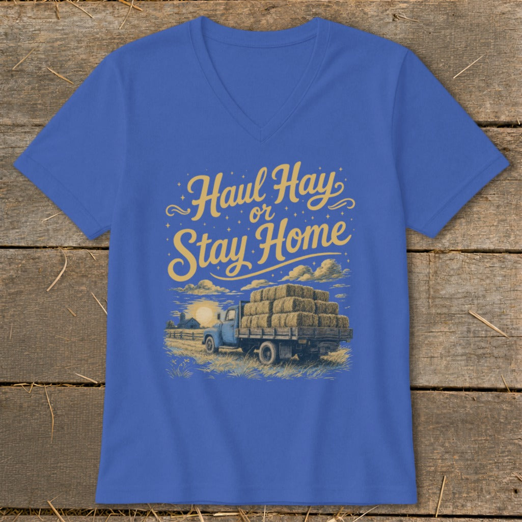 Blue t-shirt with "Haul Hay or Stay Home" text and a truck loaded with hay bales.
